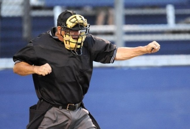 Major league umpires wear wristbands to protest 'escalating verbal